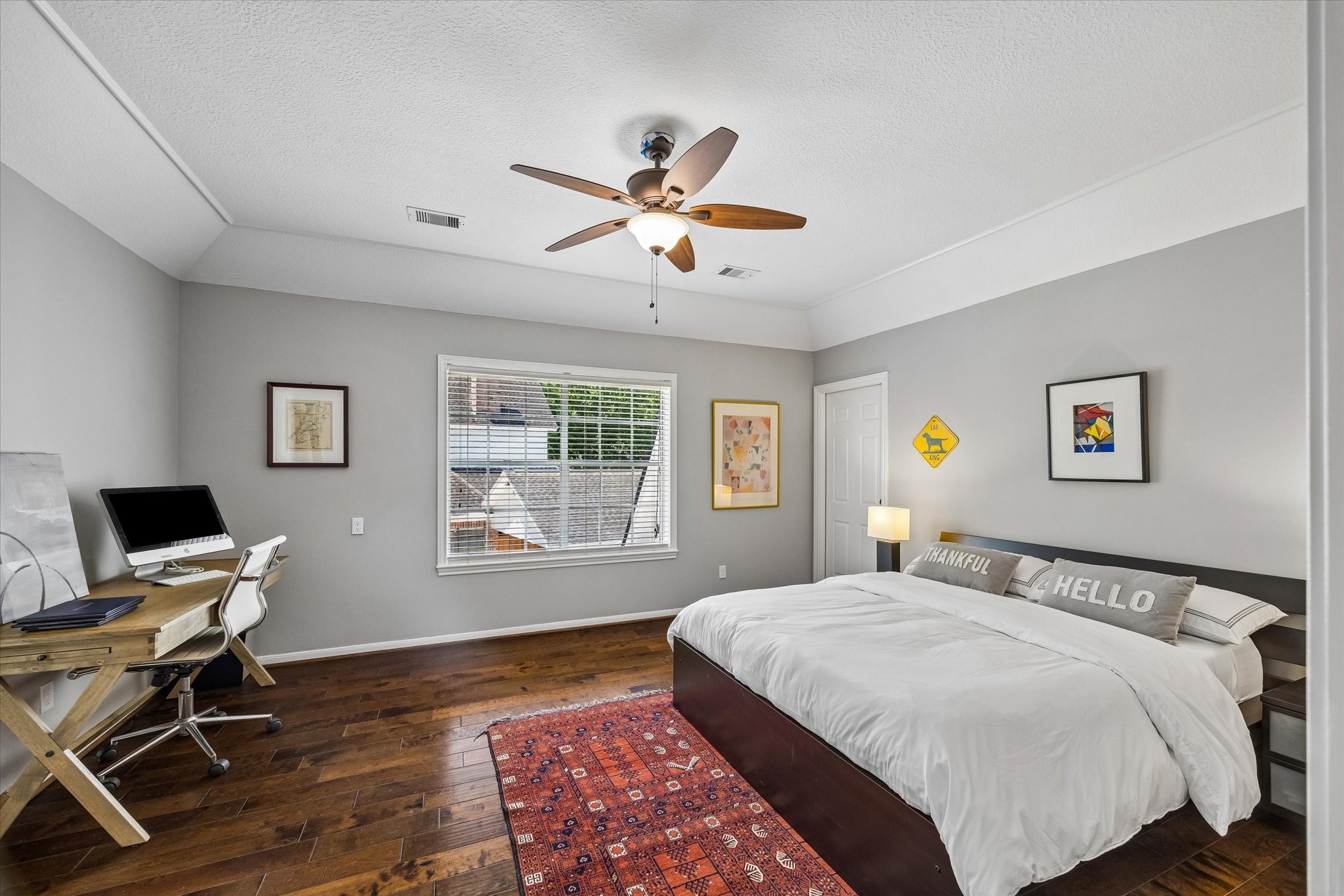 146 Golden Shadow Circle Spring, TX 77381 - Photo 28 of 41 Another view of this secondary bedroom which showcases a large window that fills the space with natural light, creating a bright and inviting atmosphere. It features direct access to a large updated full bath.