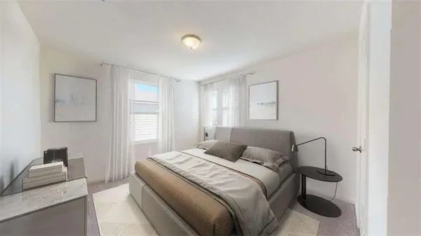 a kitchen with stainless steel appliances granite countertop a refrigerator a stove top oven a sink dishwasher and white cabinets with wooden floor