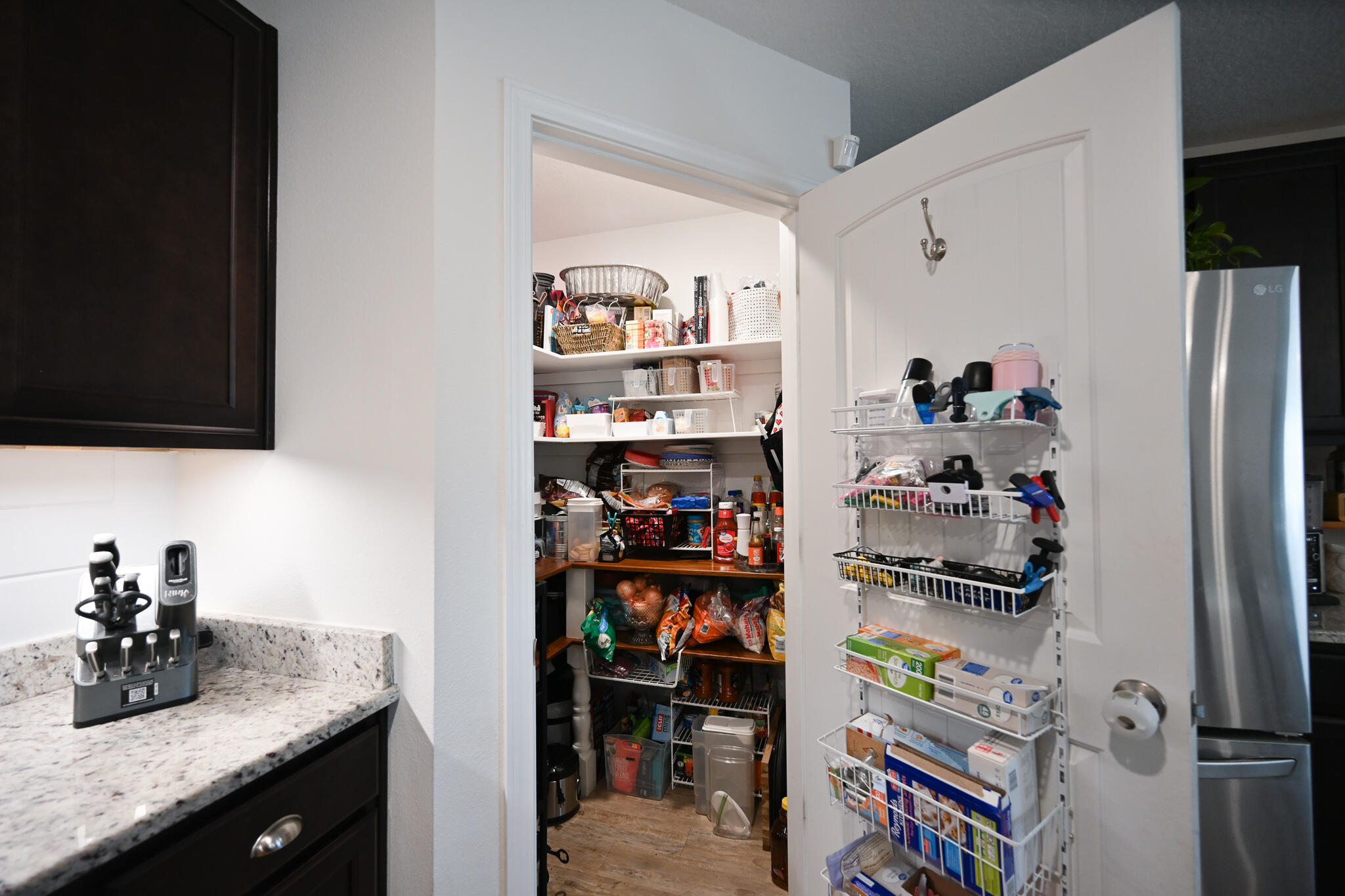 351 Merlin Court Crestview, FL 32539 - Photo 17 of 63 a kitchen with a refrigerator and a sink