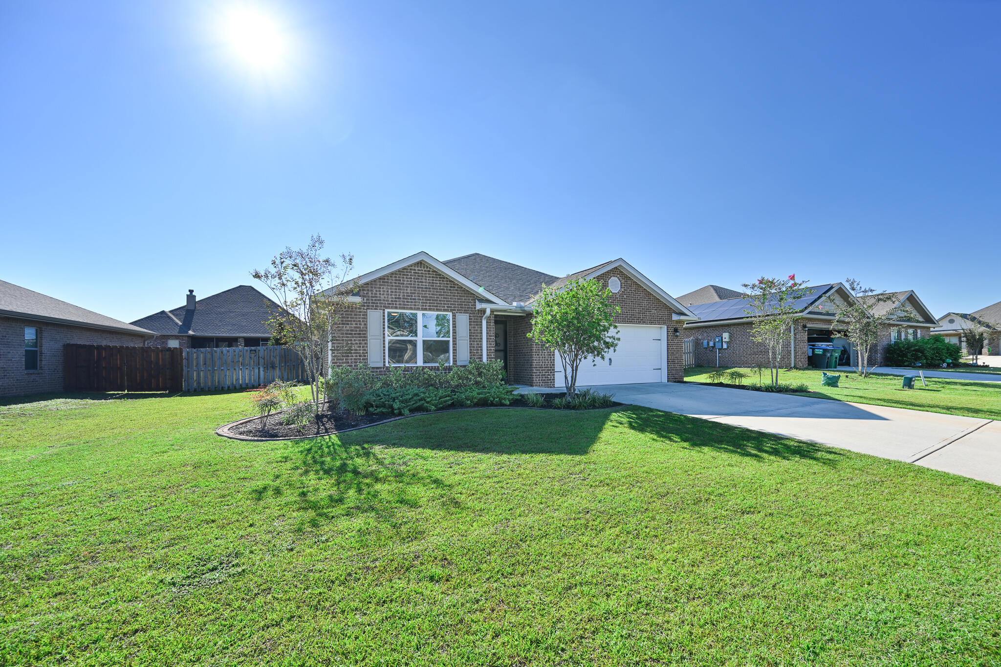 351 Merlin Court Crestview, FL 32539 - Photo 2 of 63 a front view of house with yard and green space