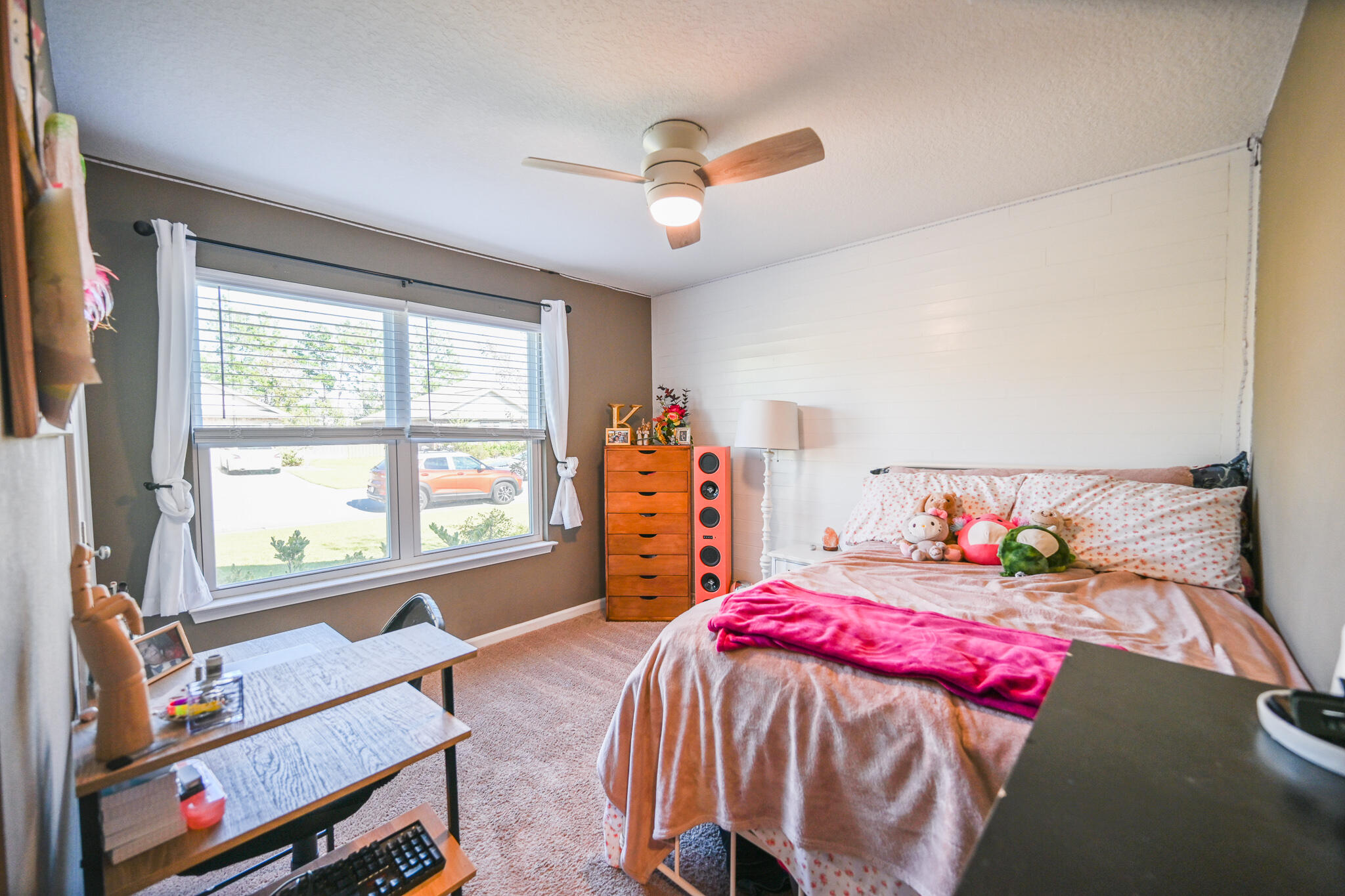 351 Merlin Court Crestview, FL 32539 - Photo 21 of 63 a bedroom with a bed and a large window