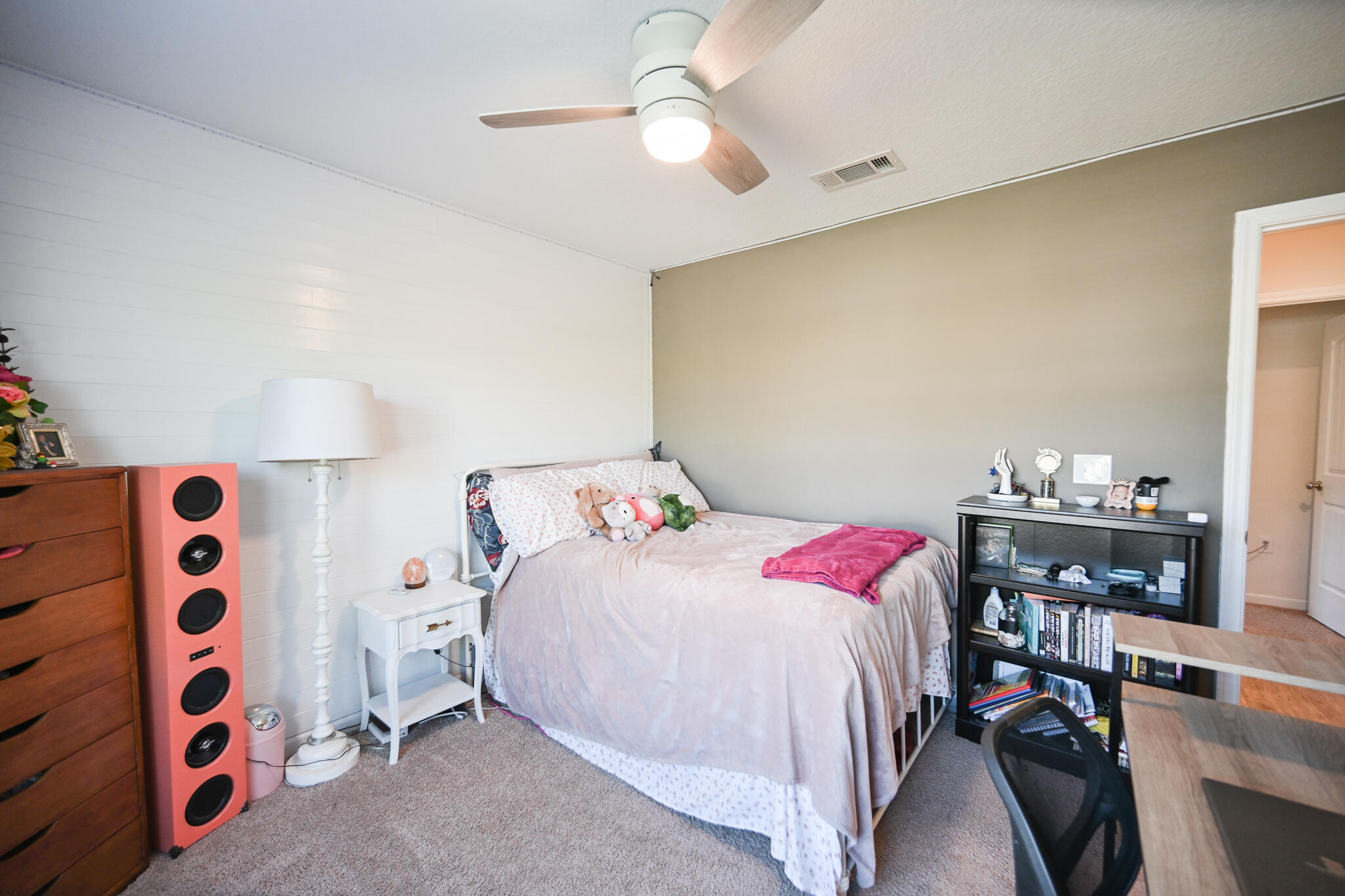 351 Merlin Court Crestview, FL 32539 - Photo 22 of 63 a bedroom with a bed and a chandelier