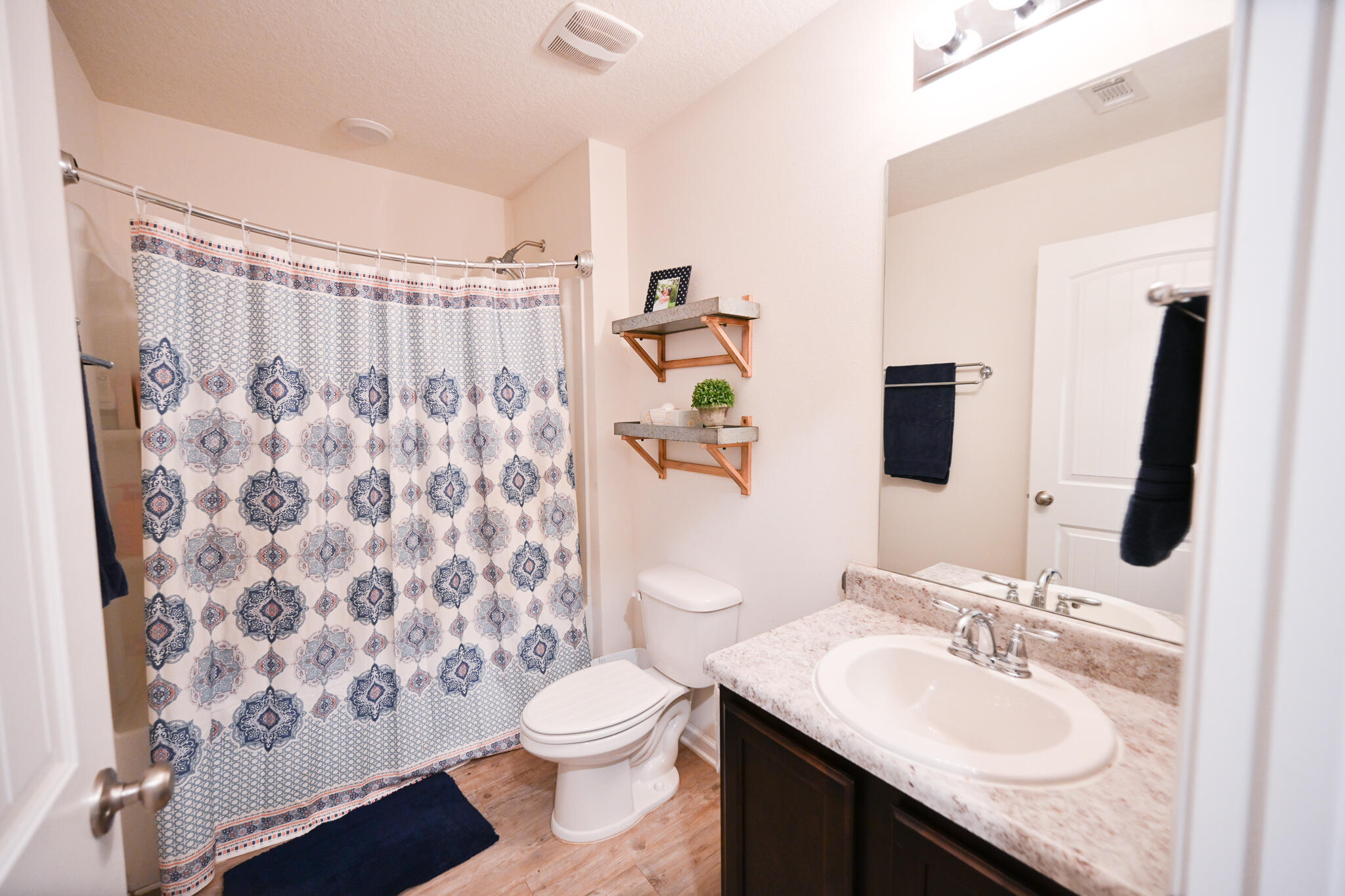 351 Merlin Court Crestview, FL 32539 - Photo 24 of 63 a bathroom with a sink toilet and shower