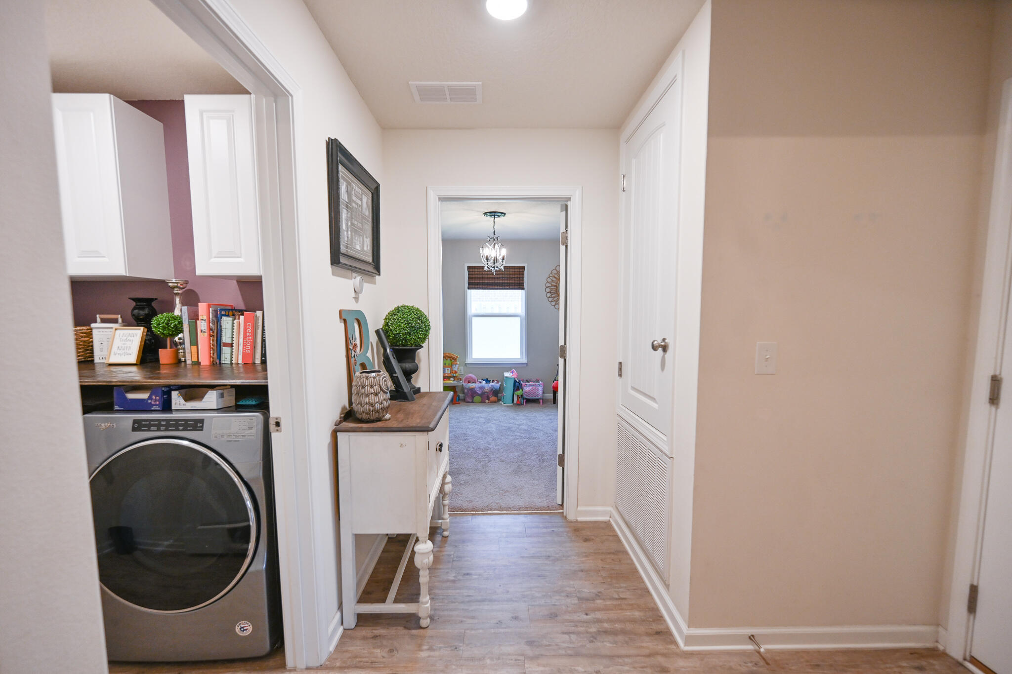 351 Merlin Court Crestview, FL 32539 - Photo 33 of 63 a view of a hallway with washer and dryer