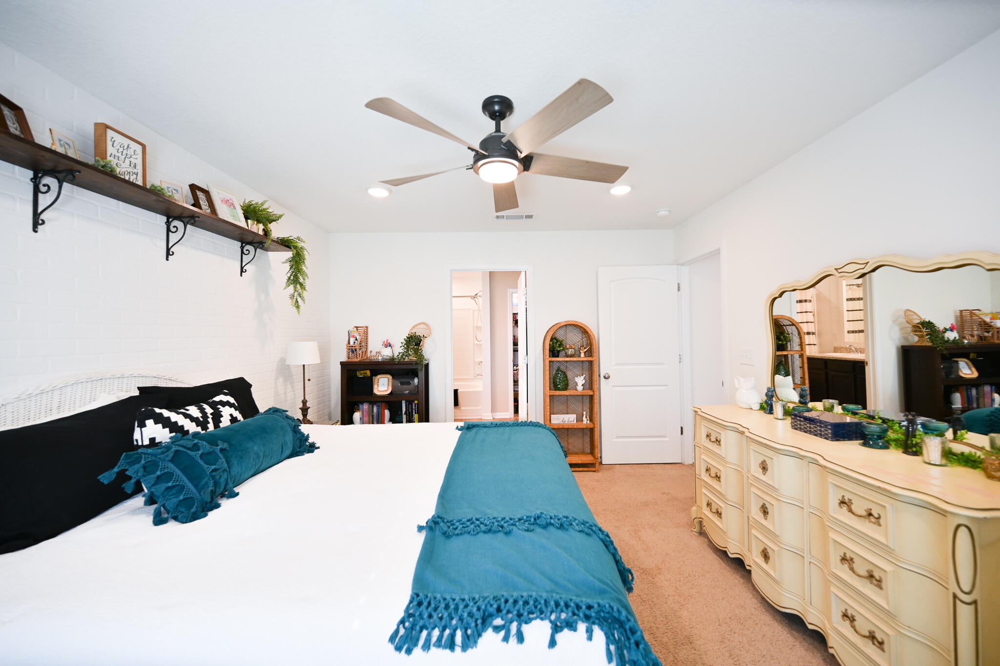 351 Merlin Court Crestview, FL 32539 - Photo 41 of 63 a bed room with a bed and a chandelier