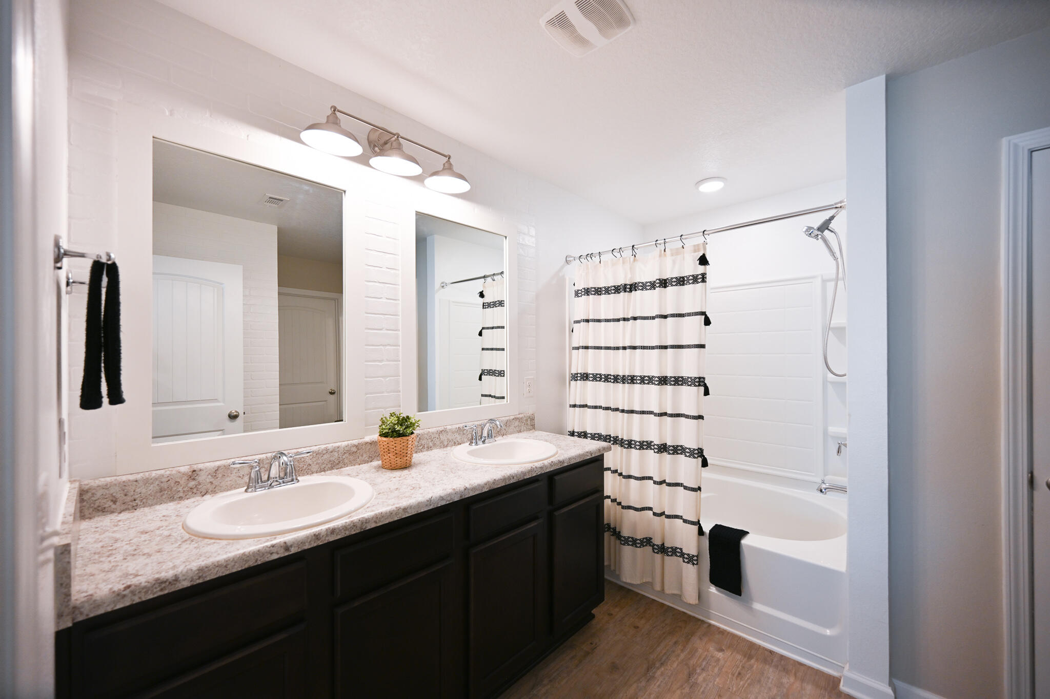 351 Merlin Court Crestview, FL 32539 - Photo 43 of 63 a bathroom with a double vanity sink mirror and double
