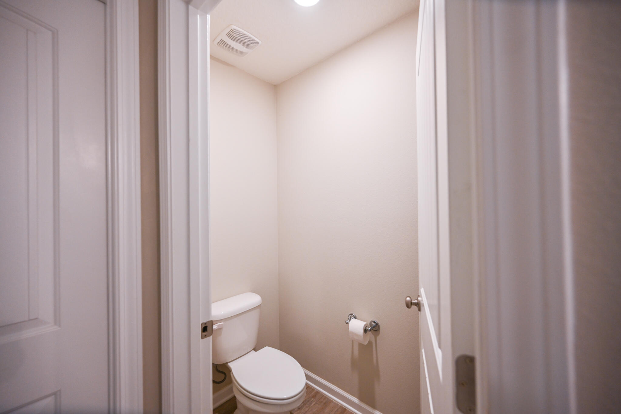 351 Merlin Court Crestview, FL 32539 - Photo 46 of 63 a white toilet sitting next to a small bathroom