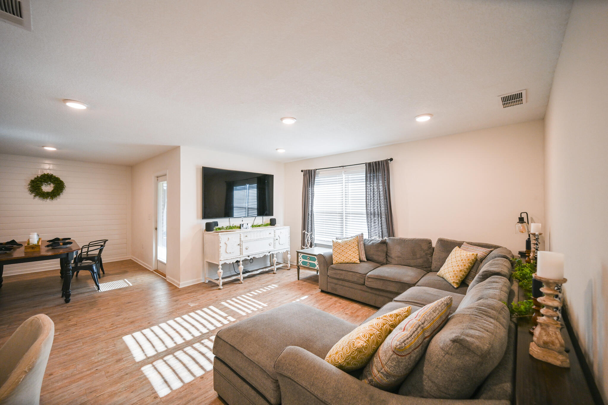 351 Merlin Court Crestview, FL 32539 - Photo 6 of 63 a living room with furniture and a flat screen tv