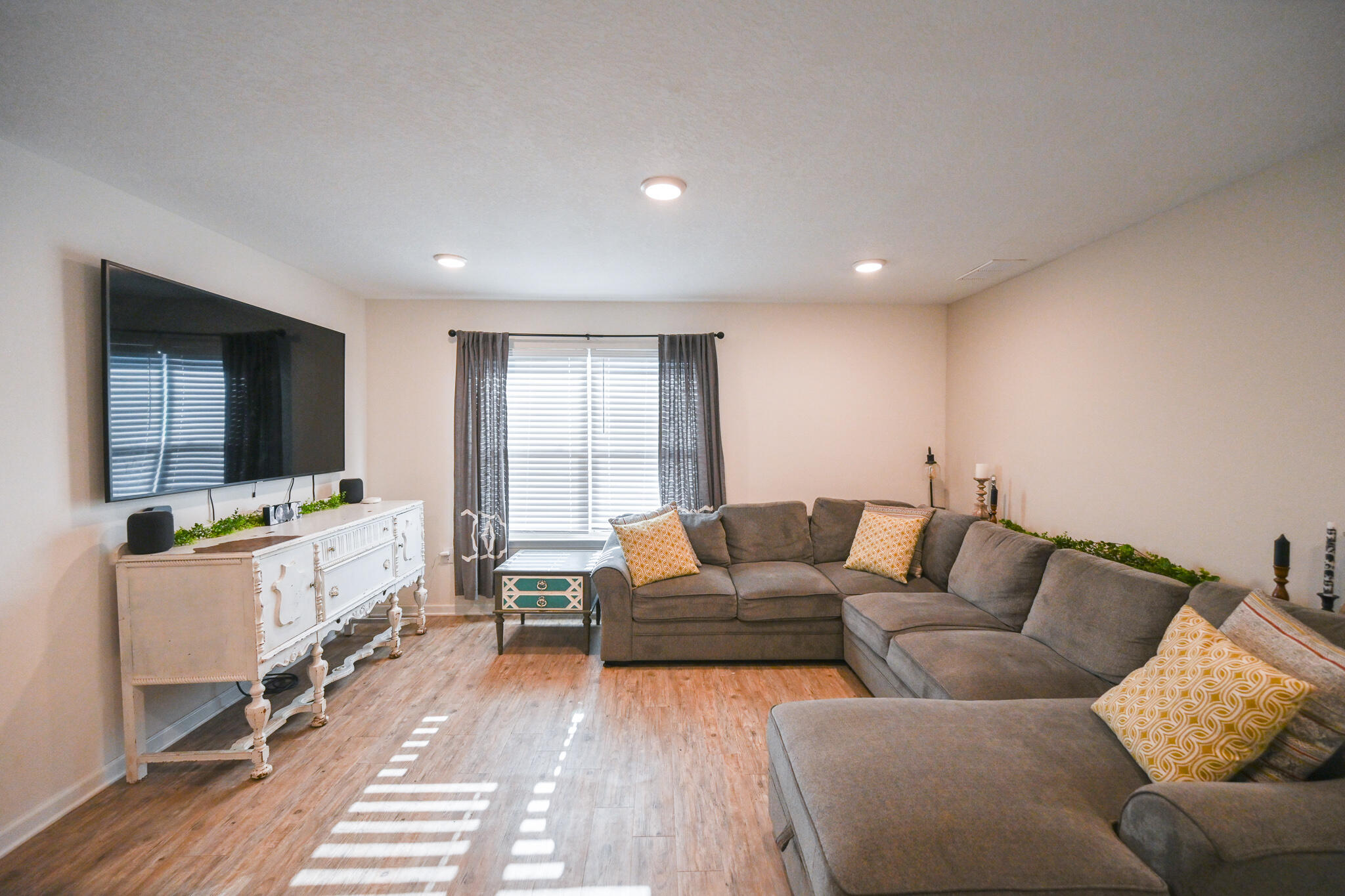 351 Merlin Court Crestview, FL 32539 - Photo 7 of 63 a living room with furniture and a flat screen tv