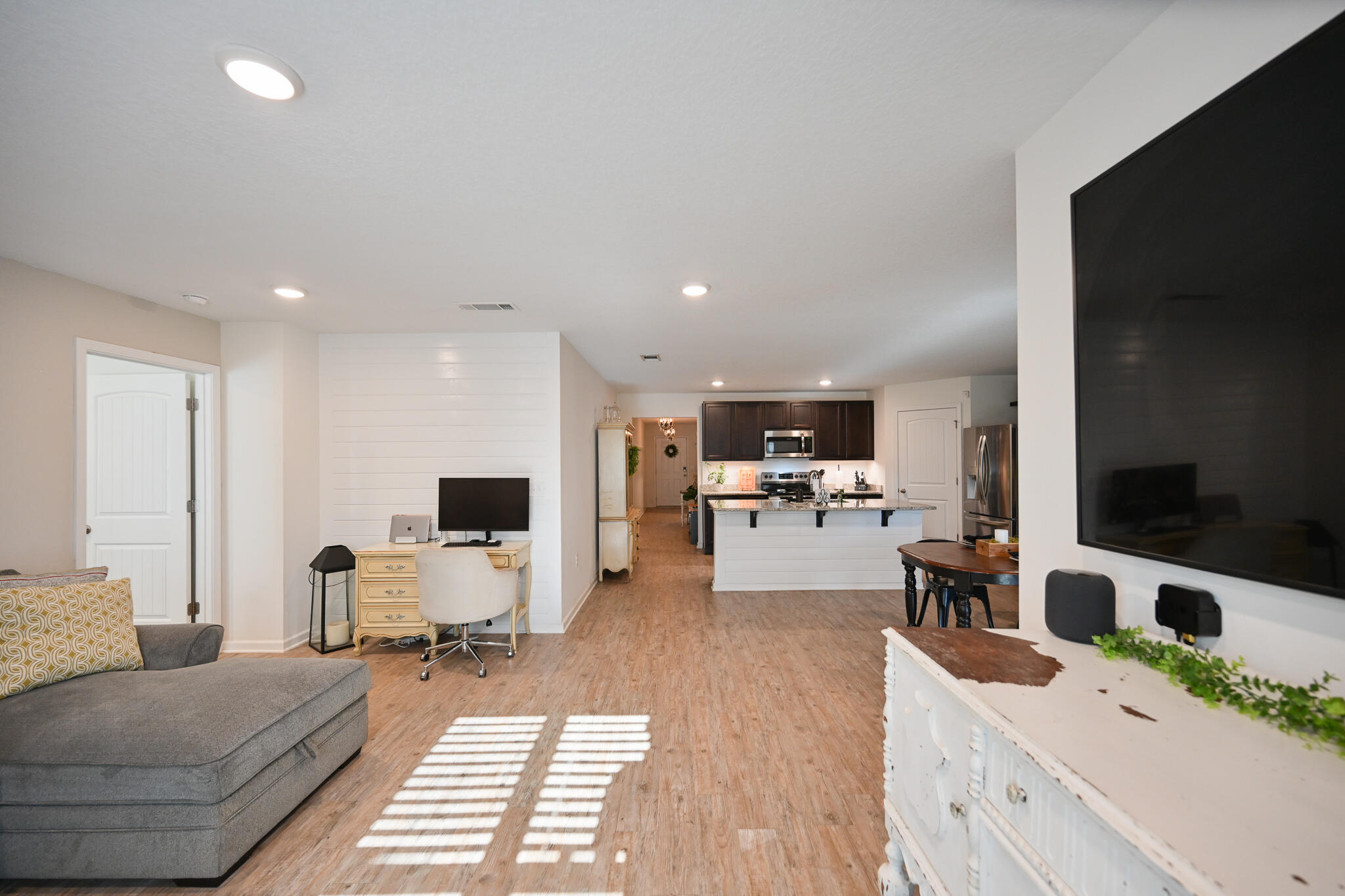 351 Merlin Court Crestview, FL 32539 - Photo 10 of 63 a living room with furniture and a flat screen tv