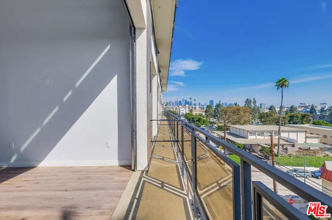 a view of a balcony with staircase