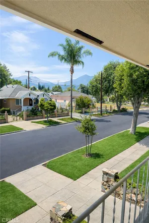 a view of a yard with a table and chairs