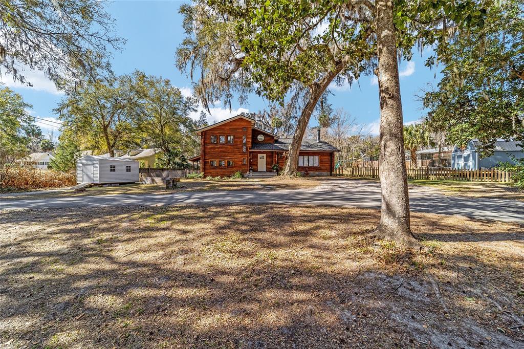 3510 Southwest 5th Court Ocala, FL 34471 - Photo 42 of 44 a house with trees in front of it