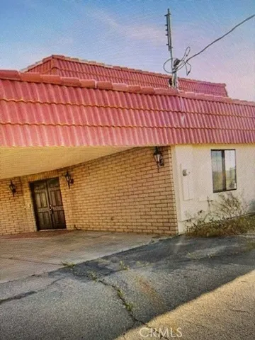 a front view of a house with a garage