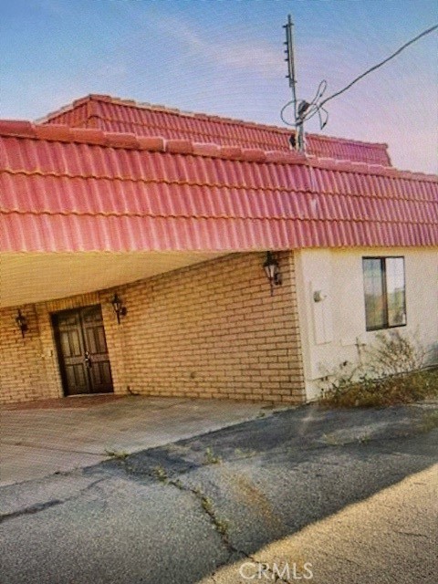 a front view of a house with a garage