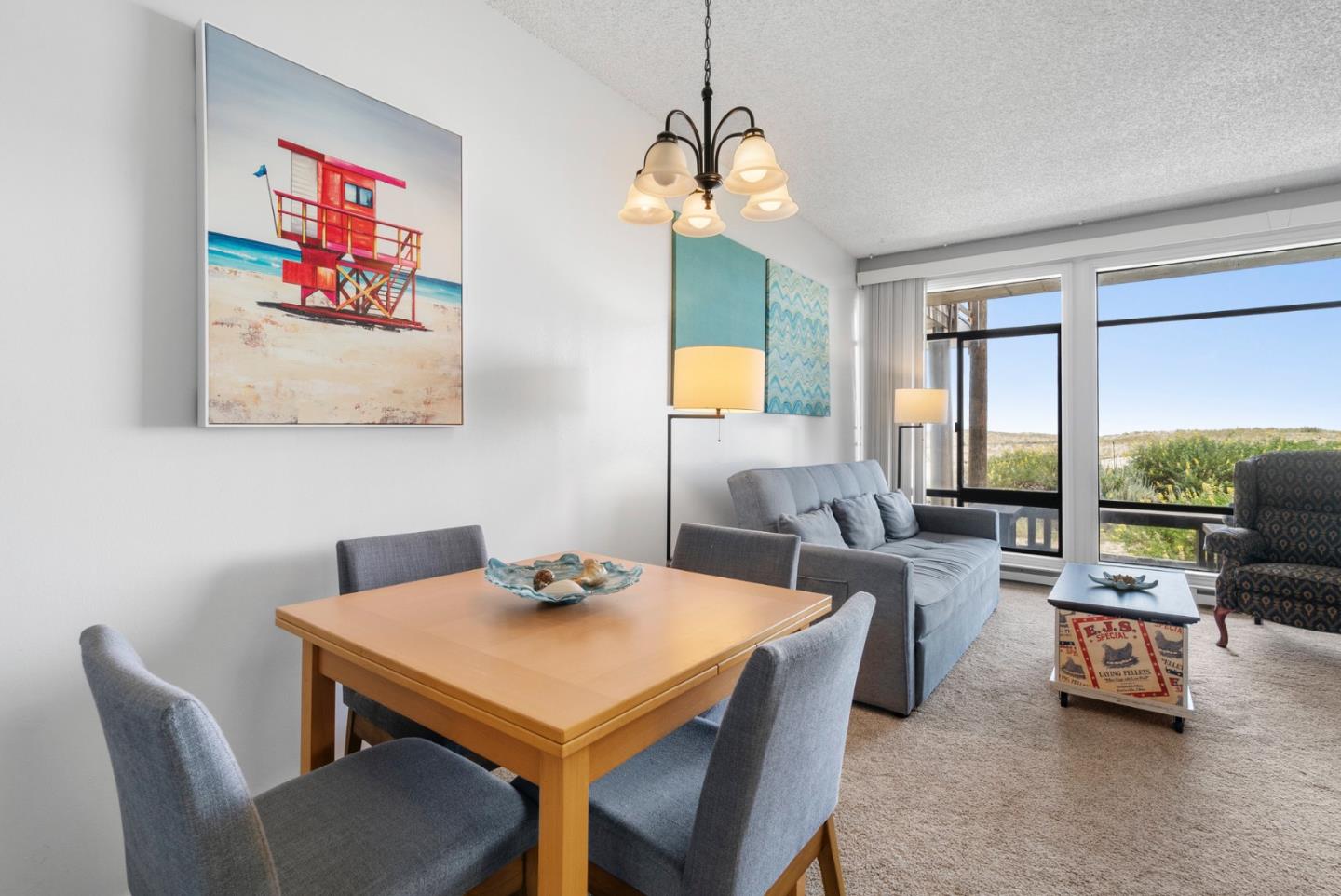 52 Pelican Point Watsonville, CA 95076 - Photo 11 of 36 a view of a dining room with furniture window and outside view
