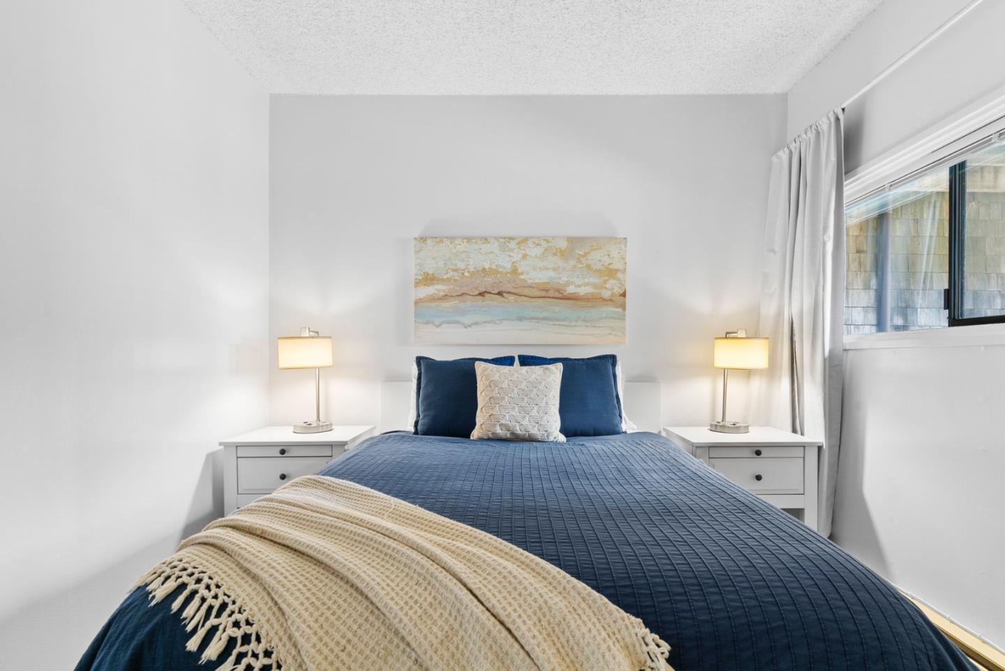 52 Pelican Point Watsonville, CA 95076 - Photo 19 of 36 a bedroom with a large bed and a window