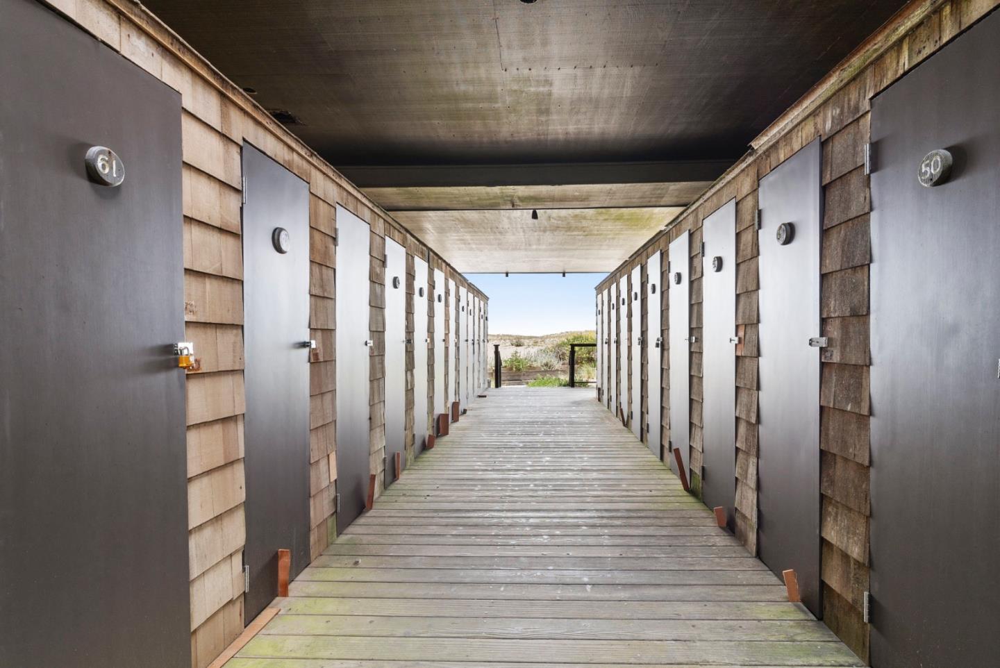 52 Pelican Point Watsonville, CA 95076 - Photo 23 of 36 a view of a hallway with wooden floor and staircase