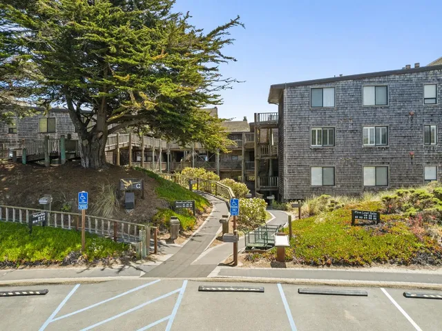 a view of a building with a road