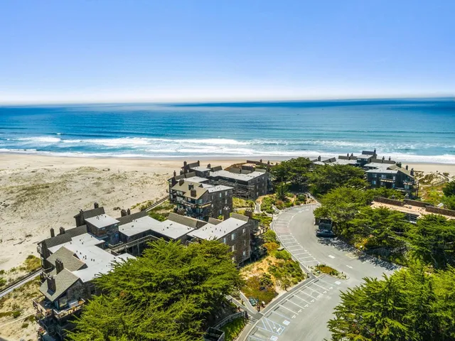 a view of a city with an ocean view