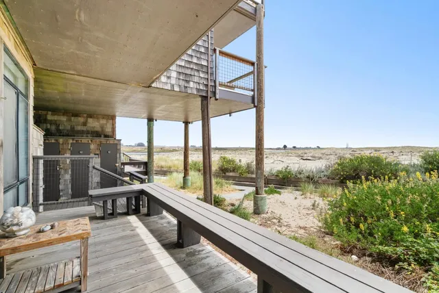 a view of a balcony with lake view and a ocean view