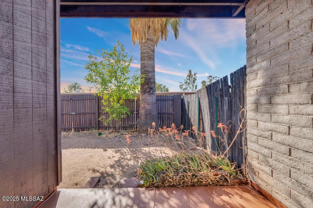 211 West Roger Road, Unit 35 Tucson, AZ 85705 - Photo 20 of 24 a view of a porch with a backyard