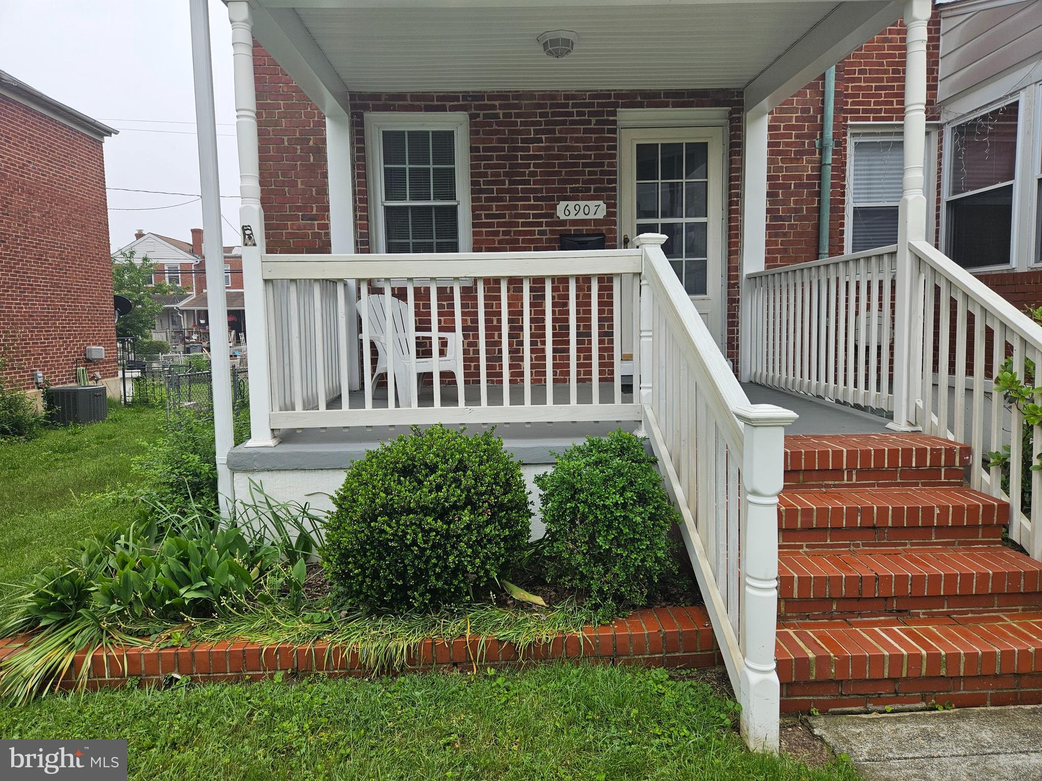 6907 Belclare Road Baltimore, MD 21222 - Photo 3 of 26 a view of a house with backyard and porch