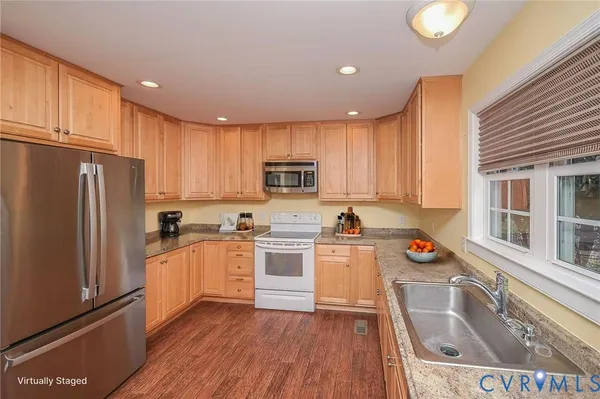 a view of a workspace with furniture