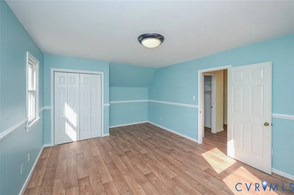 a hallway with a sink and a stove top oven