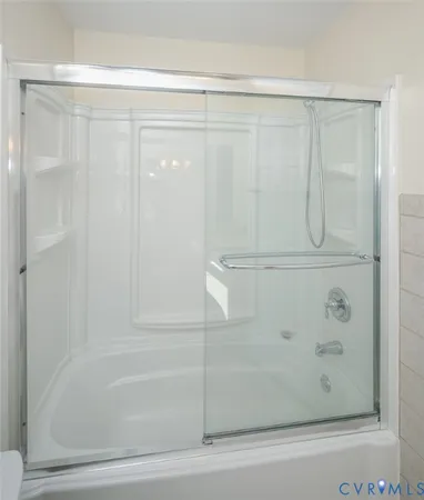 a view of a balcony with wooden floor