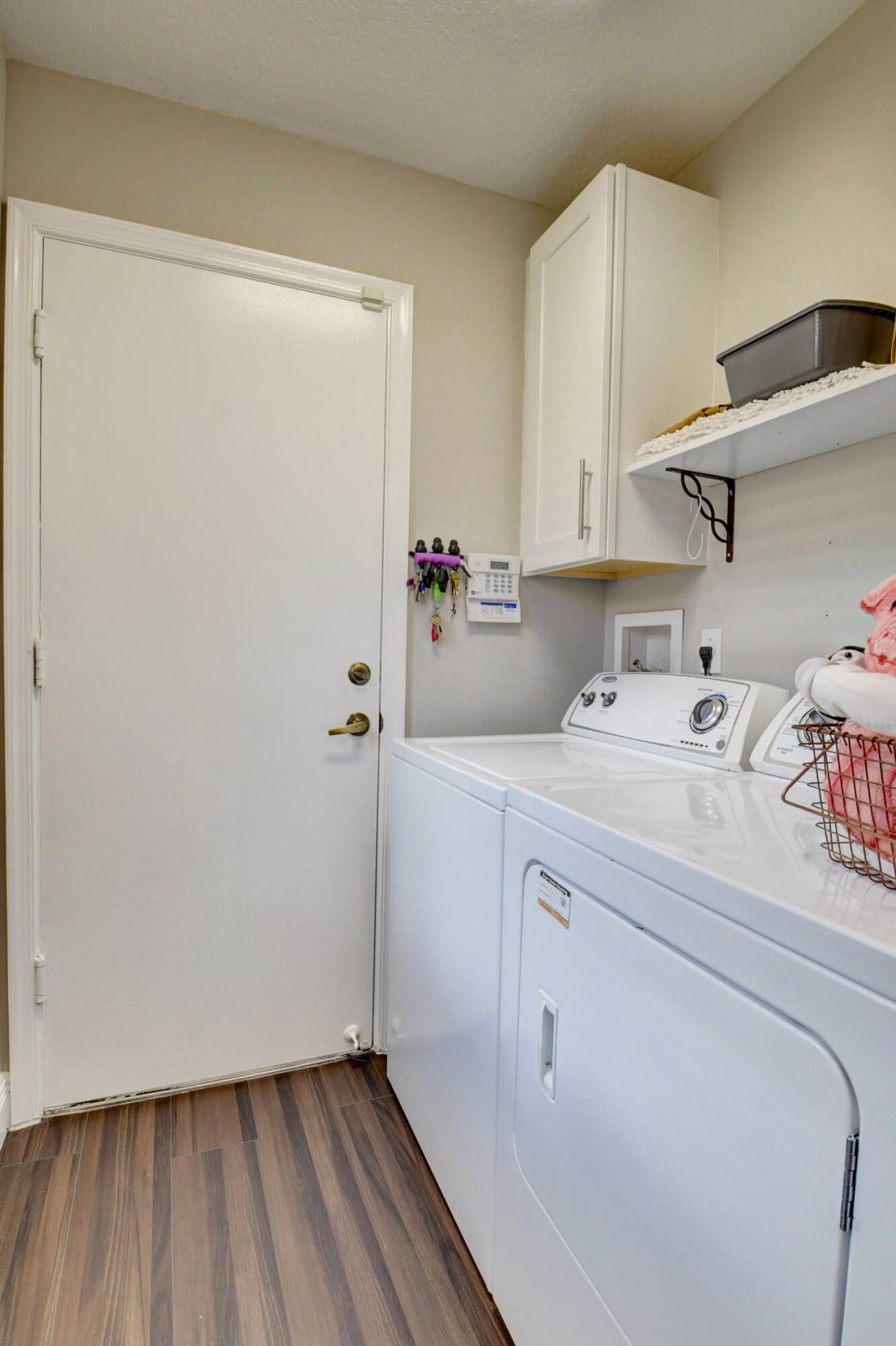 11533 Lawton Road Boynton Beach, FL 33437 - Photo 36 of 58 LAUNDRY ROOM TO GARAGE