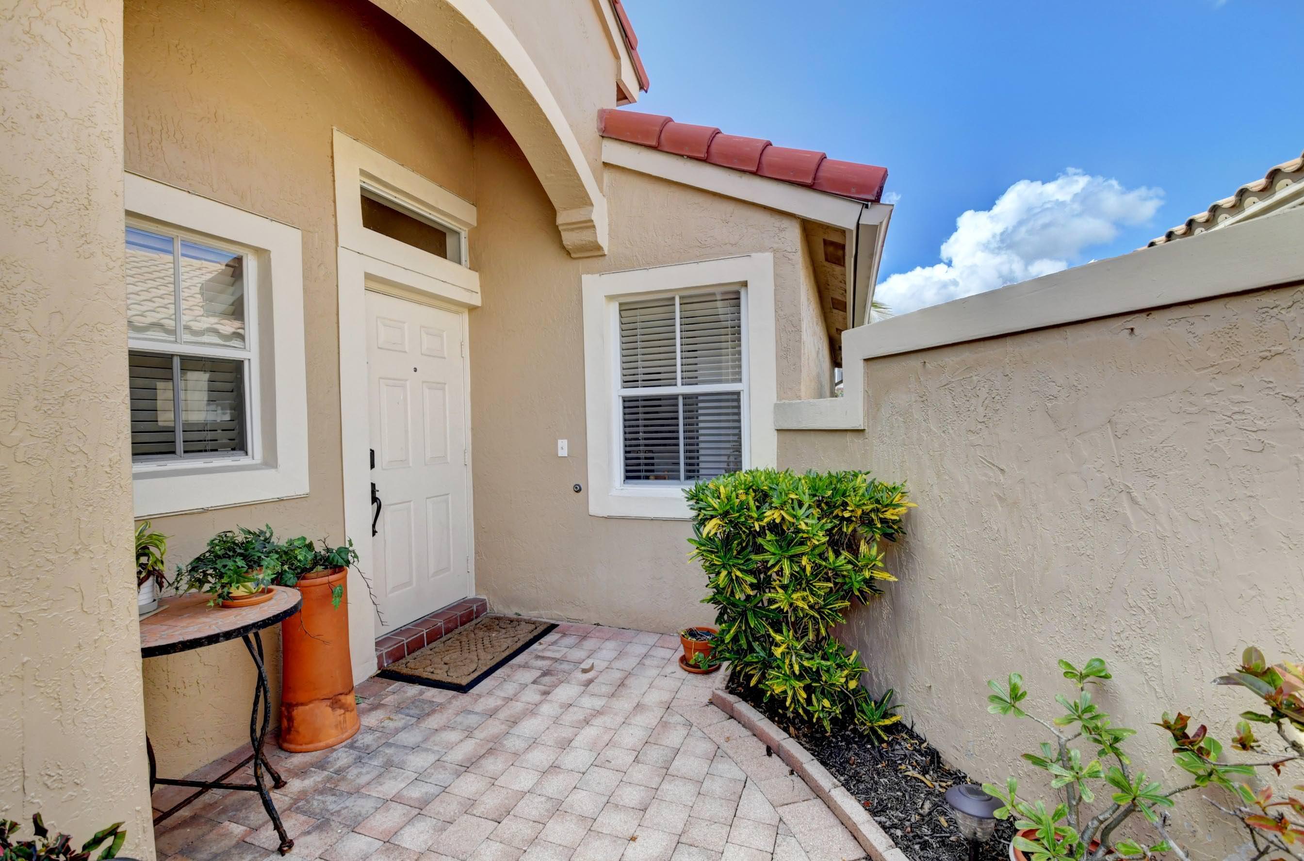 11533 Lawton Road Boynton Beach, FL 33437 - Photo 5 of 58 FRONT DOOR