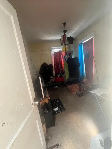 a room with furniture and gym equipment