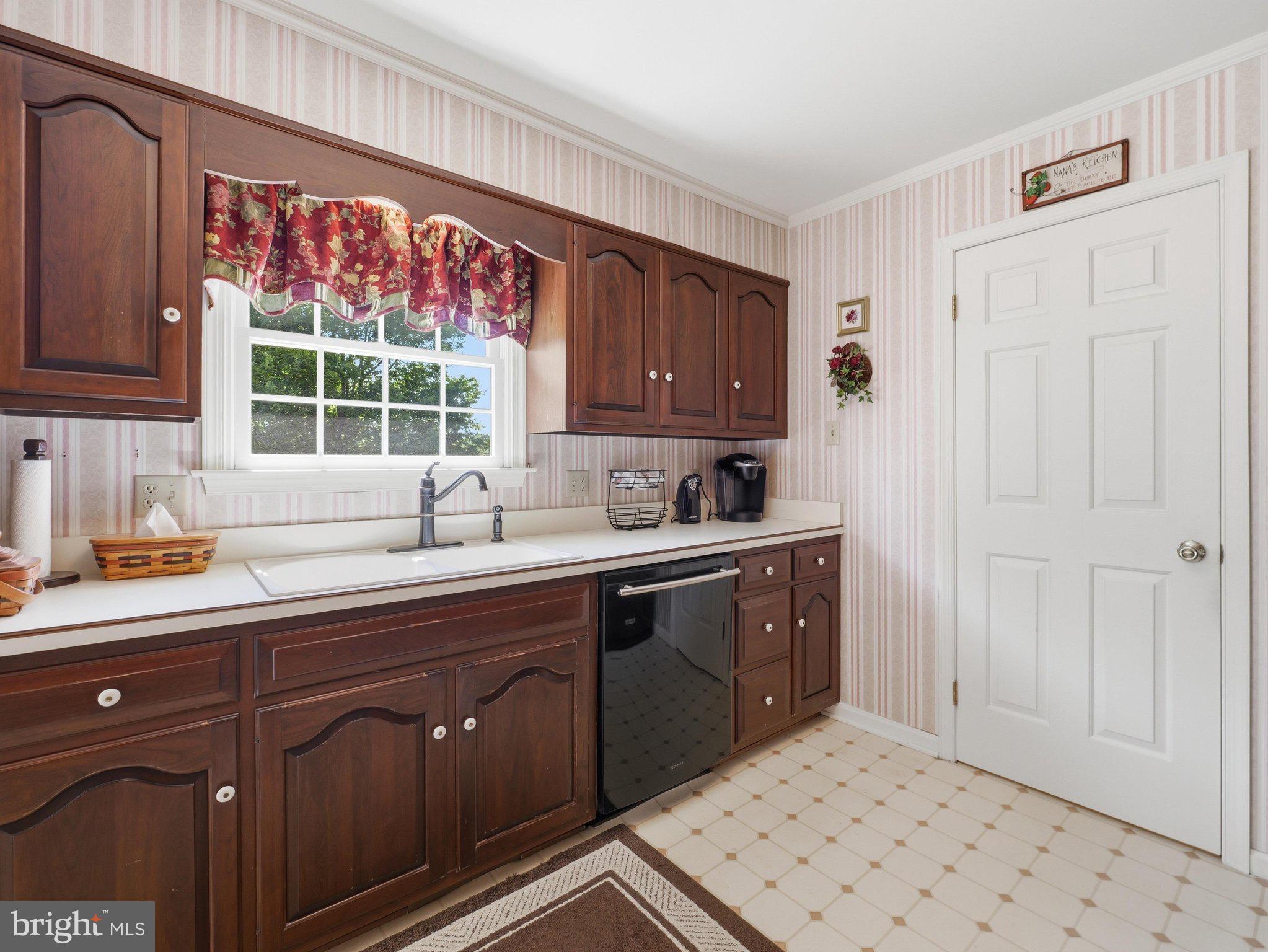 2606 Ridge Road South Martinsburg, WV 25403 - Photo 9 of 57 Charming kitchen with vintage floral accents.