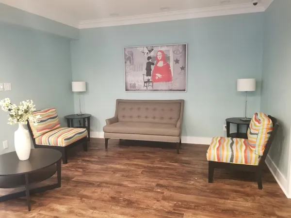 a living room with furniture and a couch