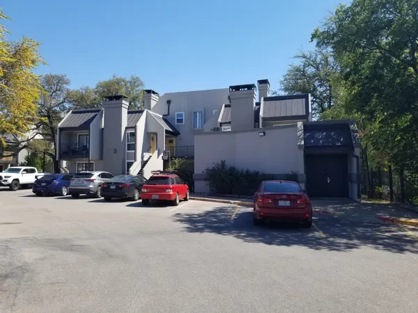 a car parked in front of a house