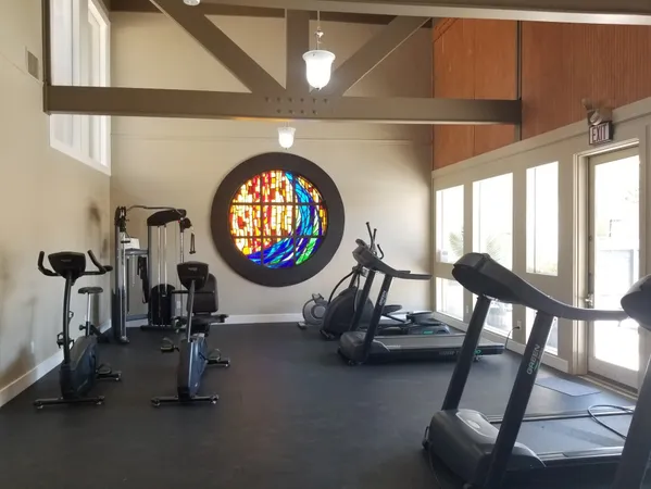 a view of a room with gym equipment