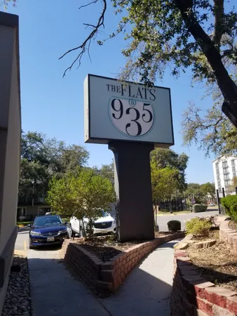 a table and chairs in a patio