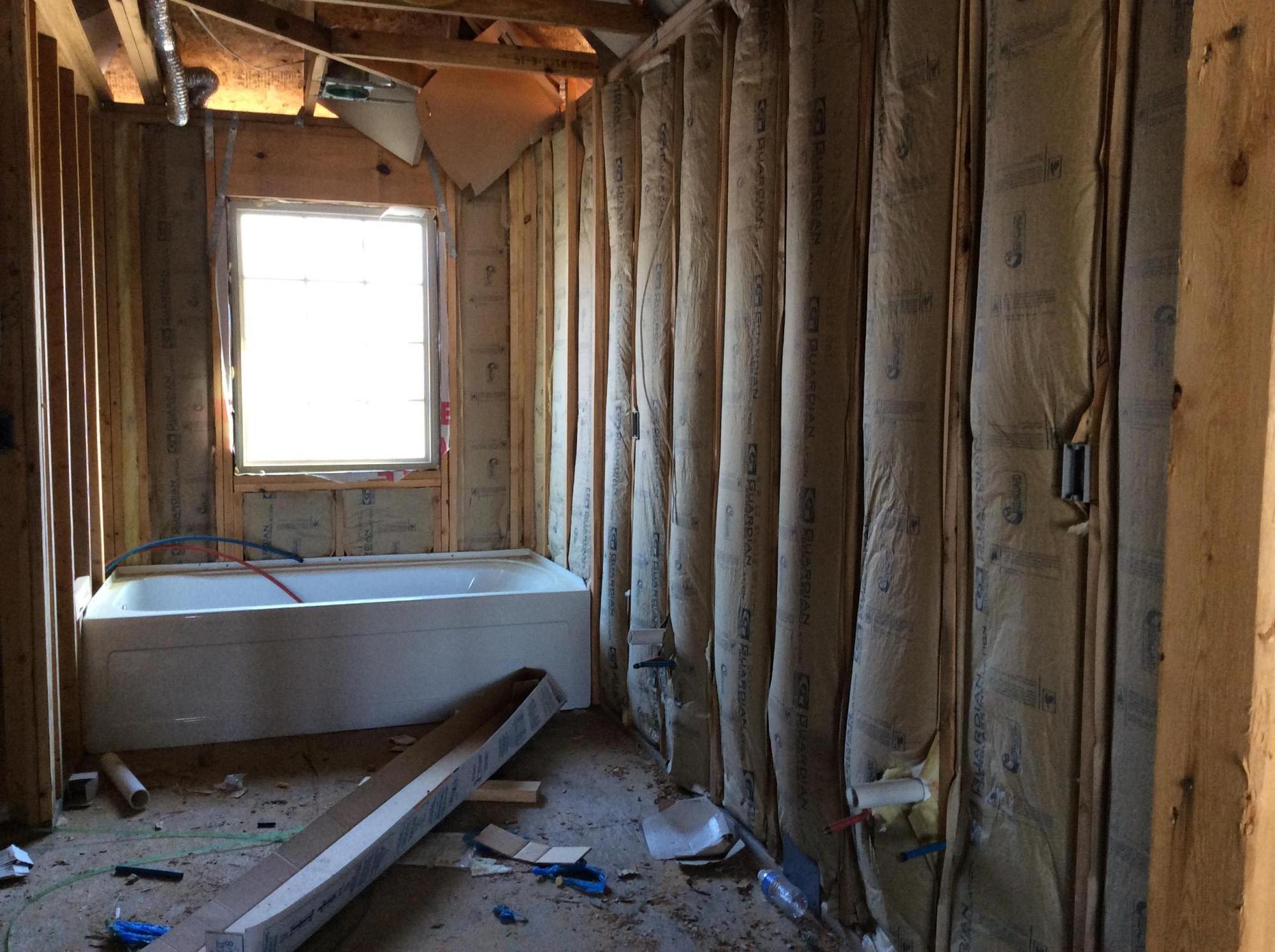 6310 Possum Ridge Road Crestview, FL 32539 - Photo 13 of 23 a bathroom with shower bathtub and window