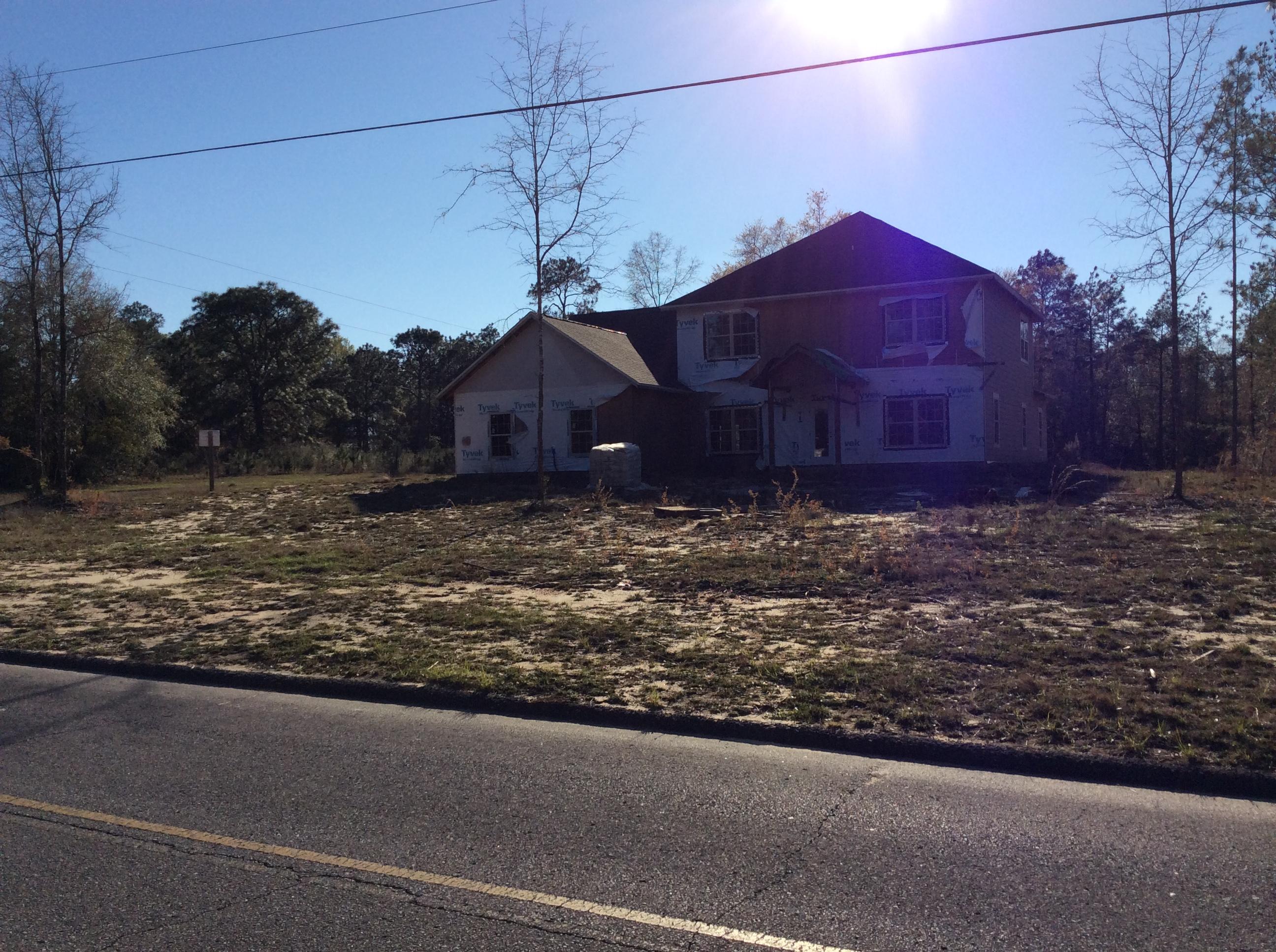 6310 Possum Ridge Road Crestview, FL 32539 - Photo 5 of 23 a view of a house with a yard