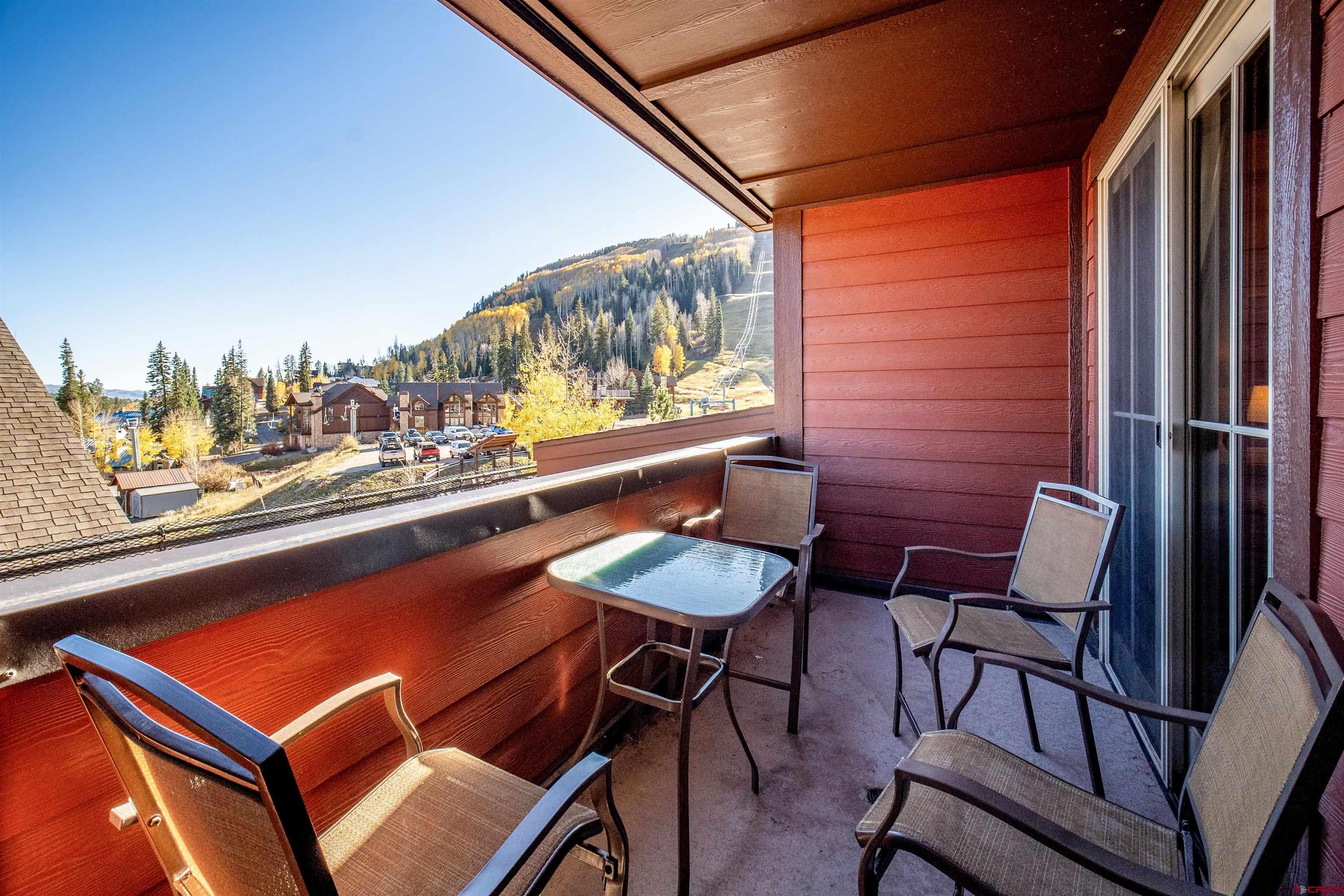 24 Sheol Street, Unit 205 Durango, CO 81301 - Photo 12 of 39 a outdoor seating area with furniture and a potted plant