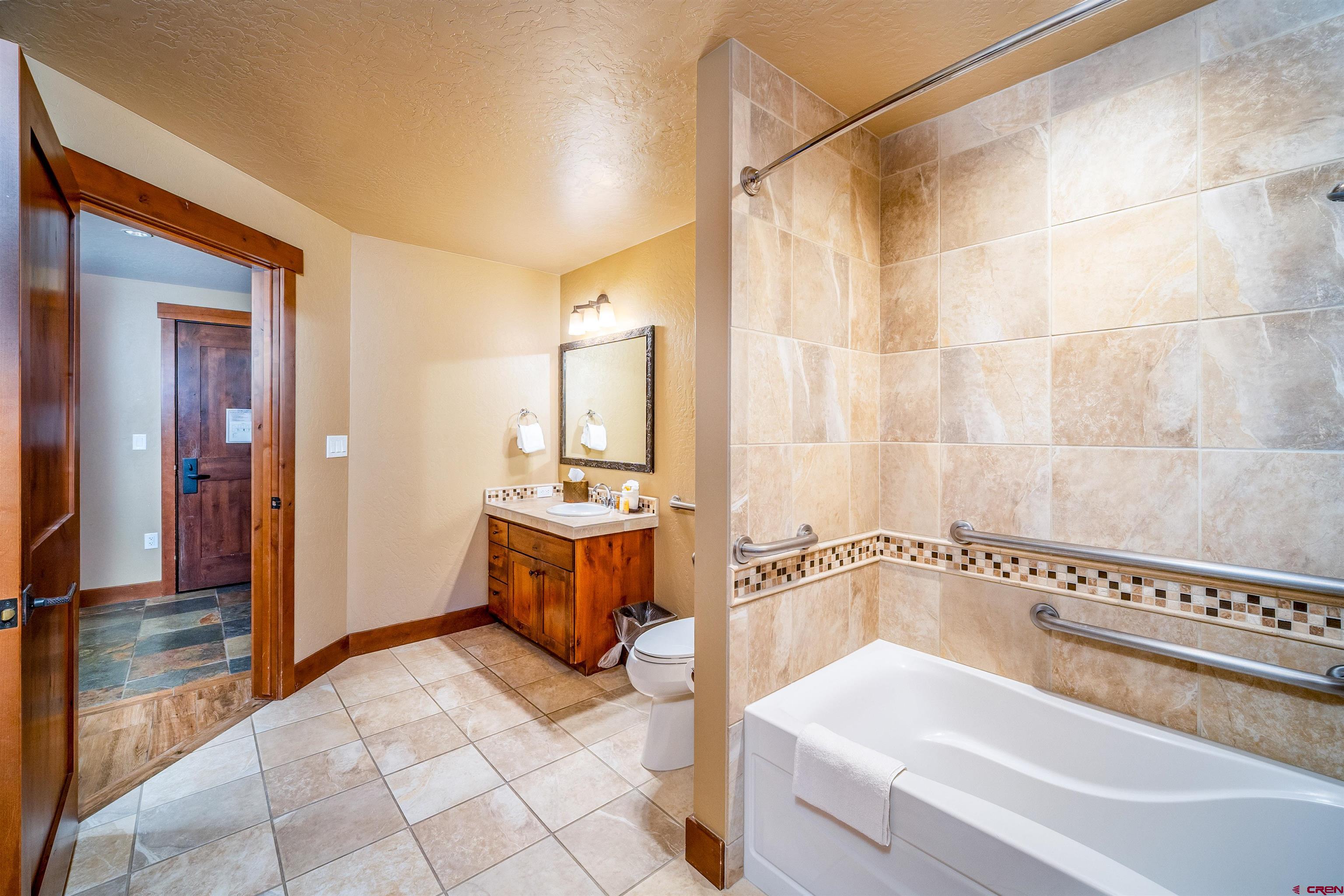 24 Sheol Street, Unit 205 Durango, CO 81301 - Photo 17 of 39 a bathroom with a bathtub and a shower