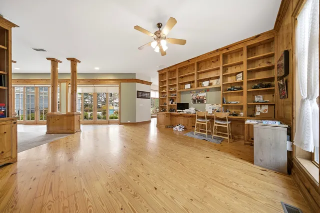 a view of livingroom with furniture and floor to ceiling window