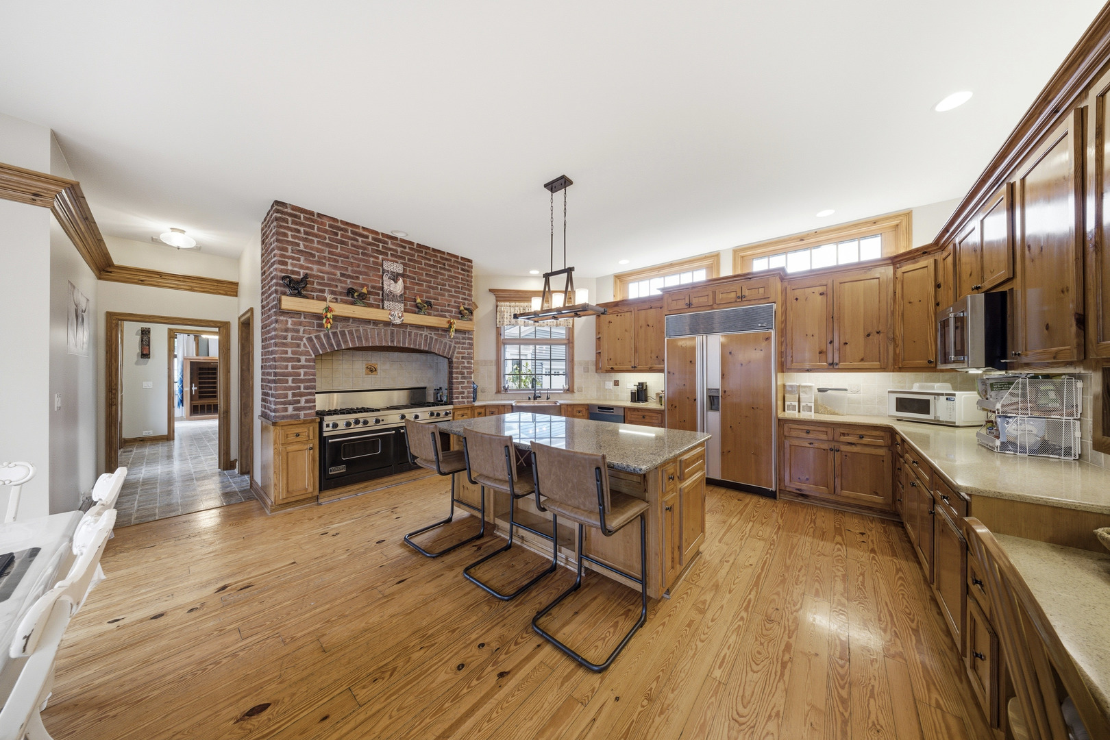 10731 Somonauk Road Hinckley, IL 60520 - Photo 23 of 48 a kitchen with a sink appliances and cabinets