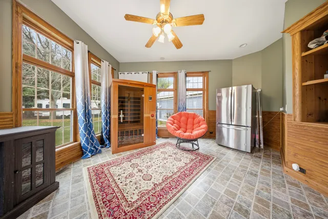 a living room with furniture and a rug