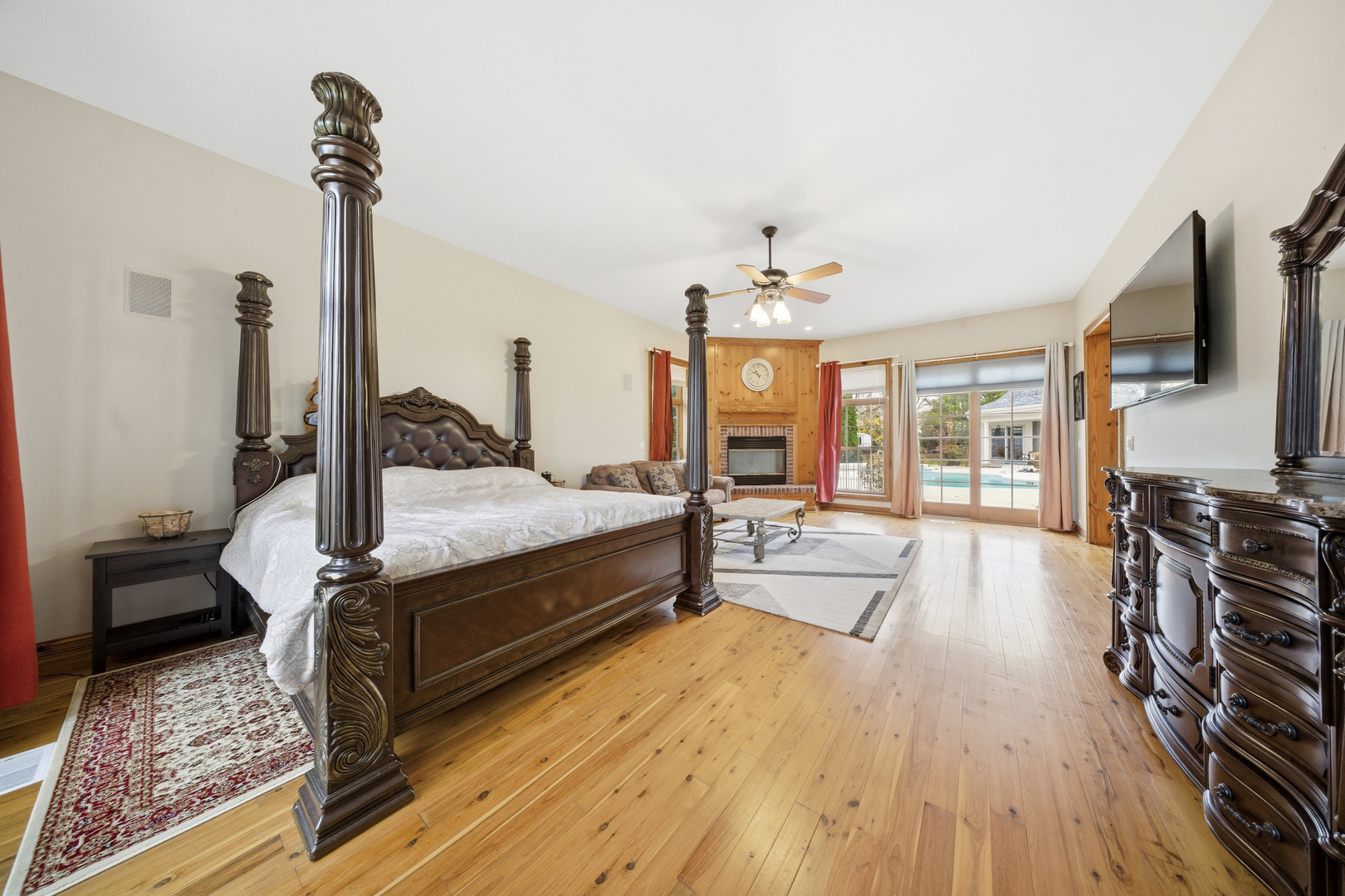 10731 Somonauk Road Hinckley, IL 60520 - Photo 36 of 48 a bedroom with furniture and a flat screen tv