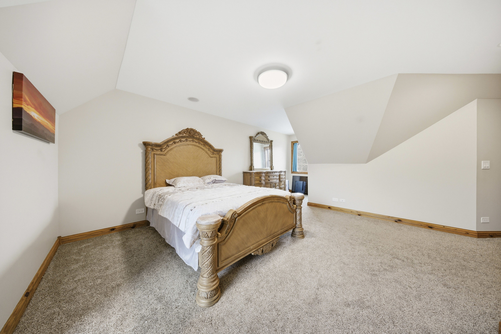 10731 Somonauk Road Hinckley, IL 60520 - Photo 38 of 48 a spacious bedroom with a bed and a night stand