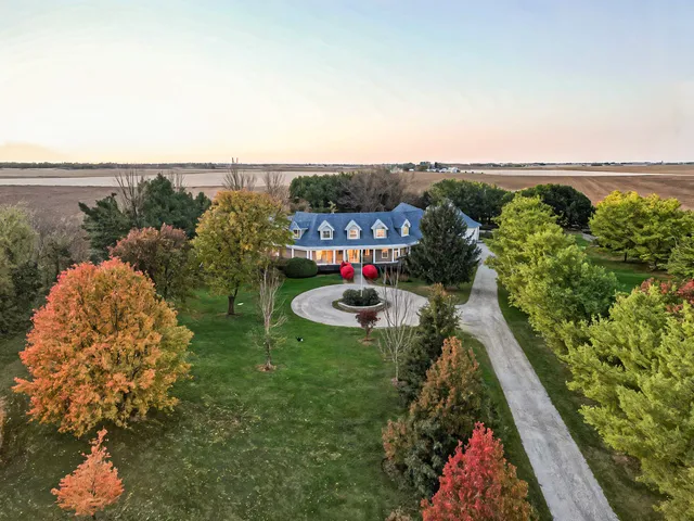 a view of a garden with an outdoor seating
