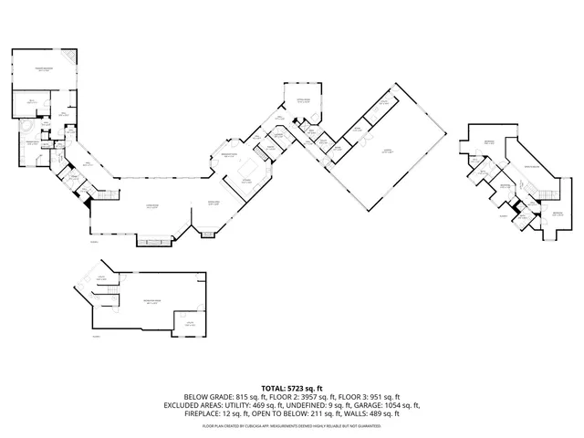 a picture of a room with a white comforter and a painting