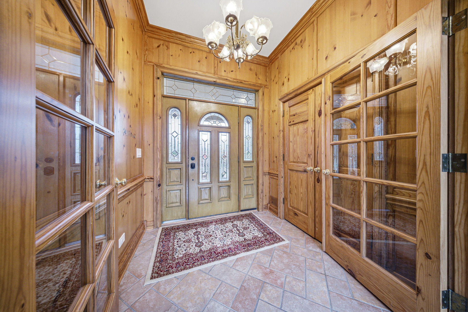 10731 Somonauk Road Hinckley, IL 60520 - Photo 7 of 48 a view of a hallway with a chandelier